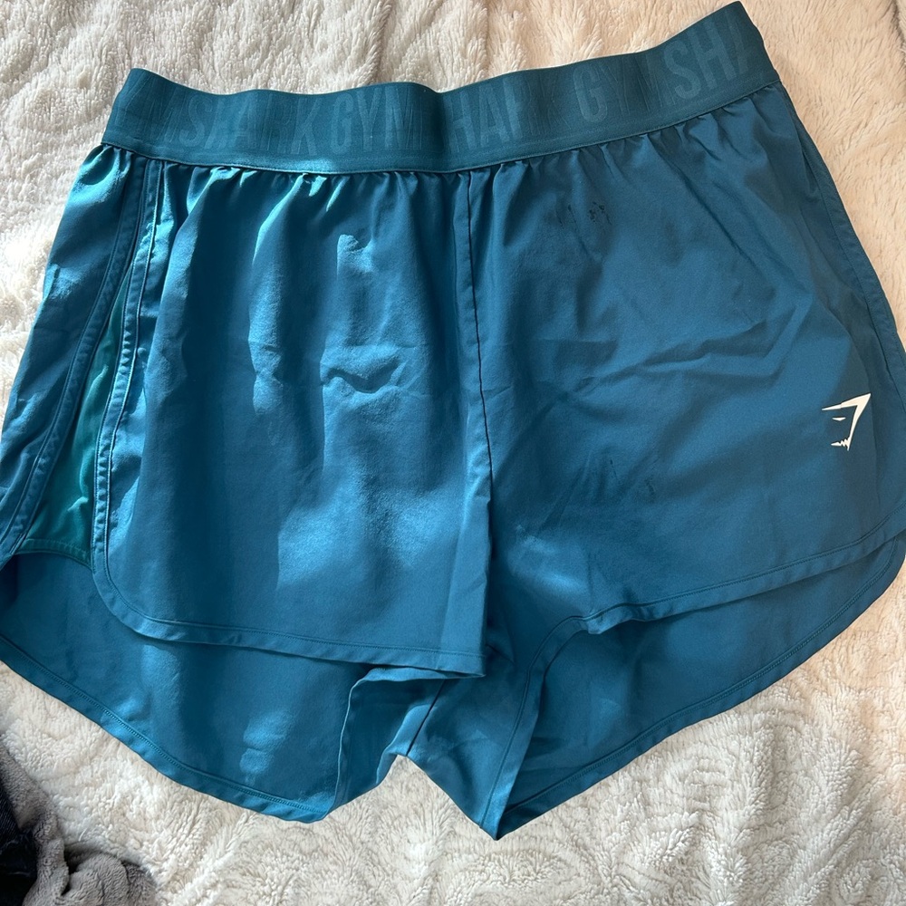 Blue/teal Gymshark shorts
